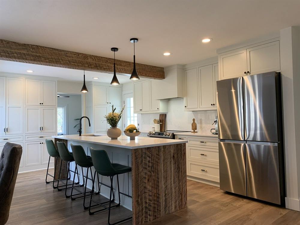 Kitchen with freshly refinished white cabinets